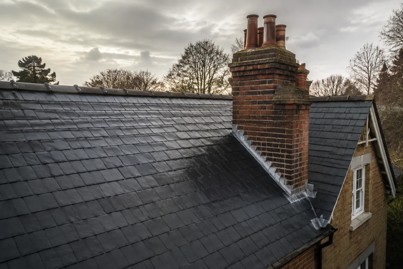 Slate roof and brick chimney on a British home